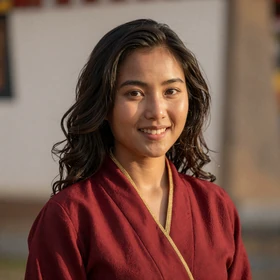 Sonam, a 24-year-old Bhutanese woman from Paro with warm smile looking for meaningful relationship