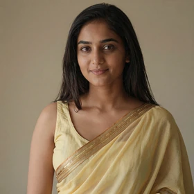 Taslima, a 26-year-old Bangladeshi woman from Dhaka wearing traditional yellow saree seeking Western husband