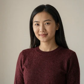 Oyungerel, a 27-year-old Mongolian woman from Ulaanbaatar with long black hair and confident smile seeking Western partner