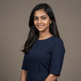 Nimasha, a 28-year-old Sri Lankan woman from Galle wearing professional attire seeking American partner